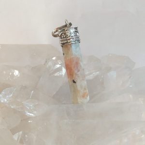 Pendentif pierre de soleil métal